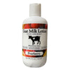 Goat milk lotion bottle with pearberry flavor on a white background