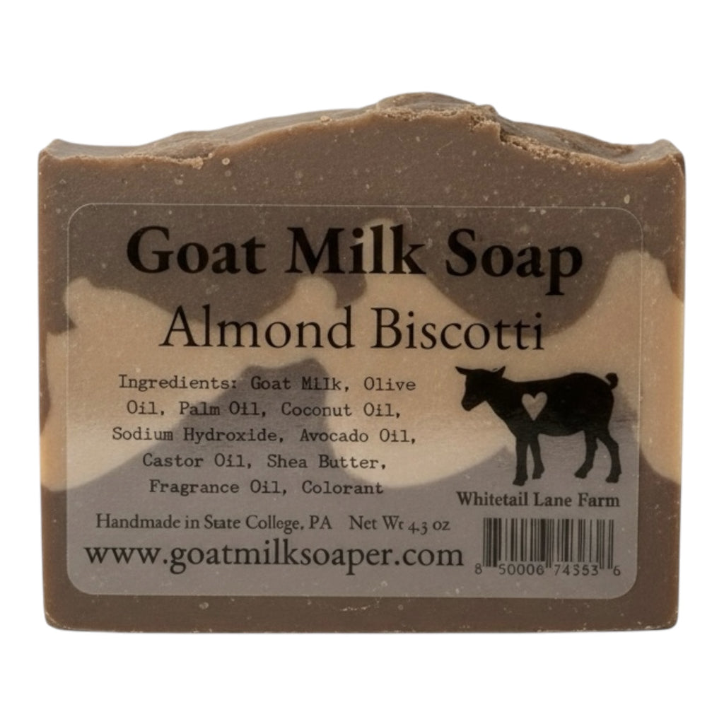Goat milk soap bar with label on a white background