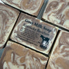 Goat Milk Soap with 'Kentucky Bourbon' flavor on a marble surface