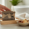 Goat Milk Soap Almond Biscotti on a wooden tray with a bowl of almonds and towel in the background.