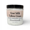 Jar of Goat Milk Tallow Cream with a black lid on a white background