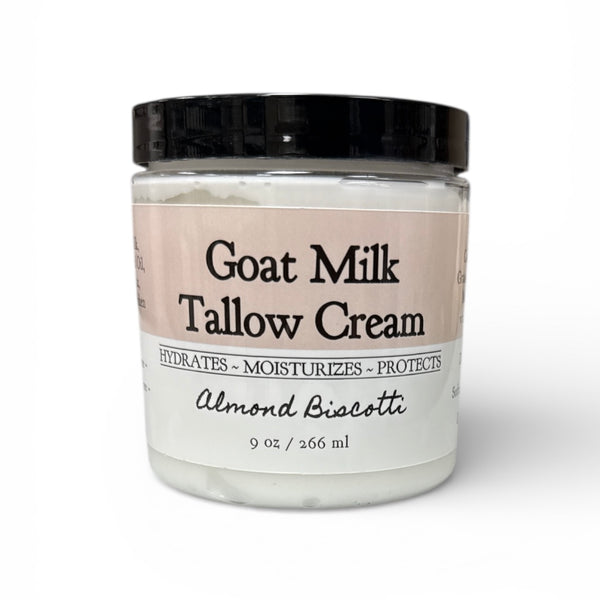 Jar of Goat Milk Tallow Cream with a black lid on a white background