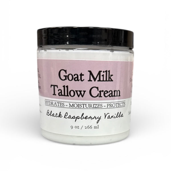 Jar of Goat Milk Tallow Cream with a black lid on a white background