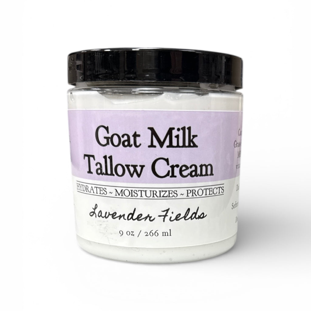 Jar of Goat Milk Tallow Cream with lavender label on a white background