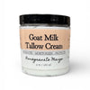 Jar of Goat Milk Tallow Cream with a black lid on a white background