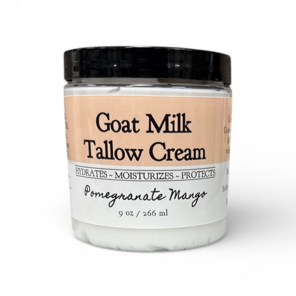 Jar of Goat Milk Tallow Cream with a black lid on a white background