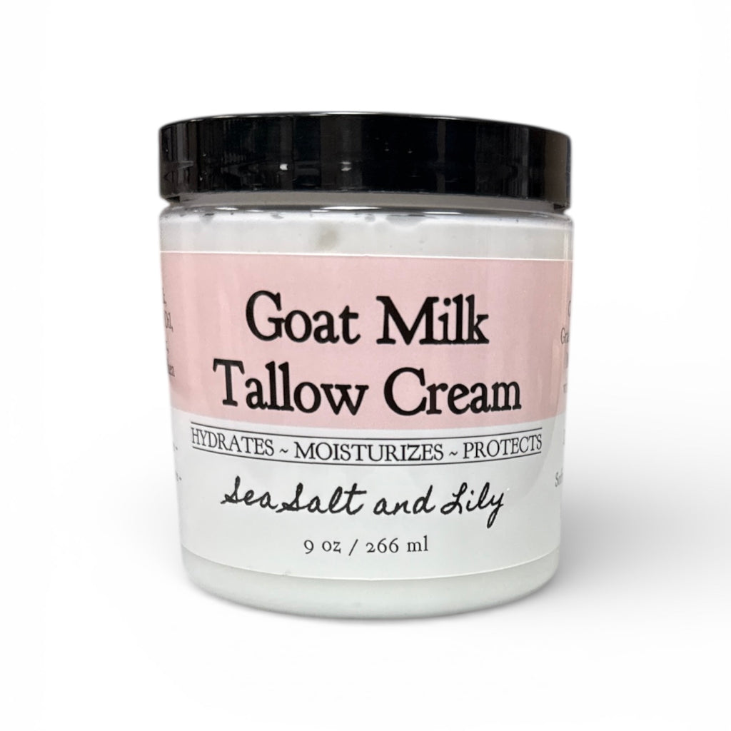 Jar of Goat Milk Tallow Cream with a black lid on a white background
